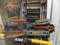 Firma vyráběla hračky z plechu a především modely železnice